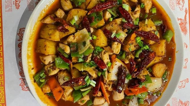 D16. 新疆大盘鸡無骨 Xinjiang Cumin Chicken Without Bone.