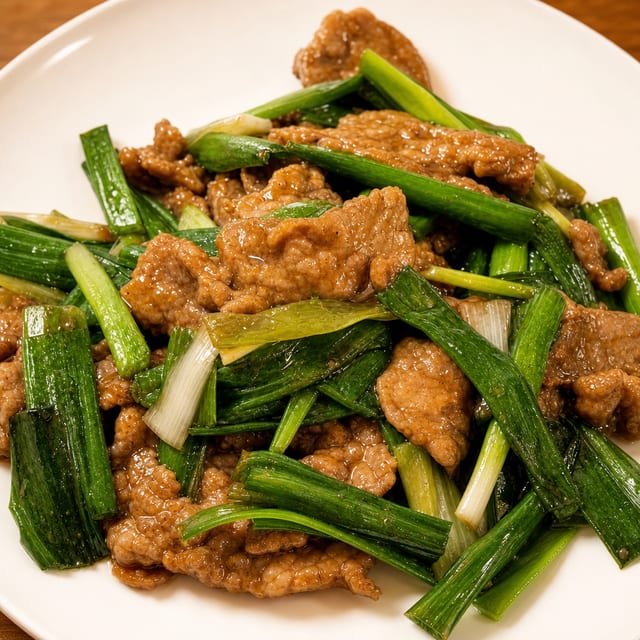 E4. 葱爆牛肉 Fire Wok Scallion Beef.