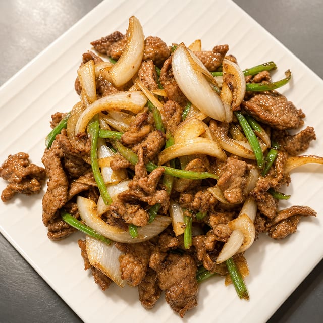 E6. 孜然牛肉 Cumin Beef.